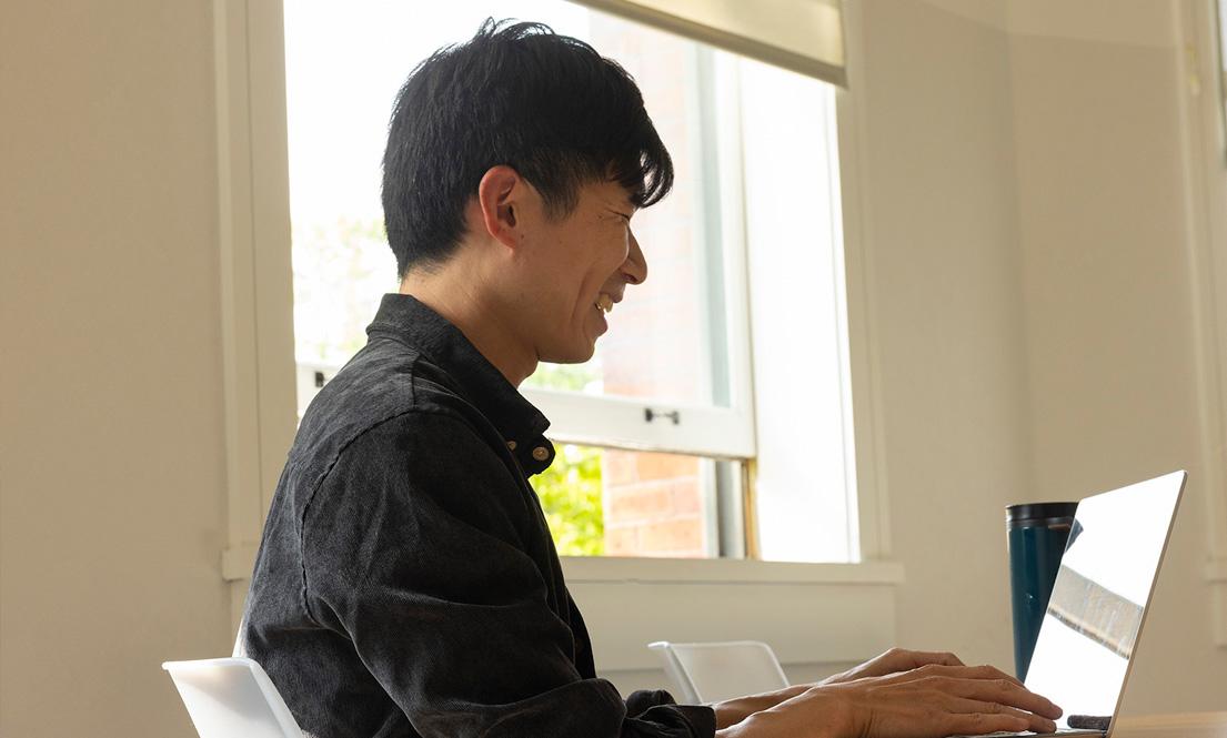 Student working on a laptop